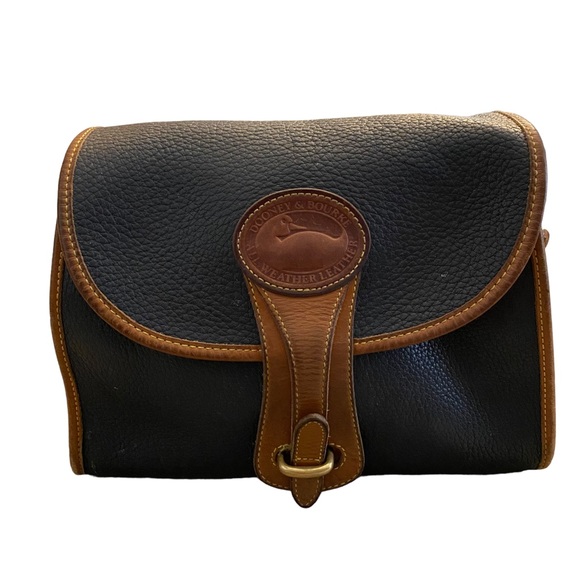 Dooney & Bourke Handbags - Vintage Dooney and Bourke All Weather Leather Purse